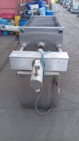 TMCI Padovan filter press – end view with pipe connections and control box